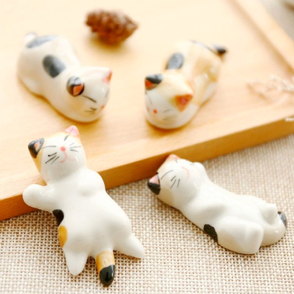 Porcelain Cat Chopstick Holders SetKitchenYellow Pandoracat, chopsticks, dining, gift, gift ideas, kitchen, kitten19cat, chopsticks, dining, gift, gift ideas, kitchen, kittenKitchenPorcelain Cat Chopstick Holders SetPorcelain Cat Chopstick Holders Set - Premium Kitchen from Yellow Pandora - Just CHF 19! Shop now at Maria Bitonti Home Decor