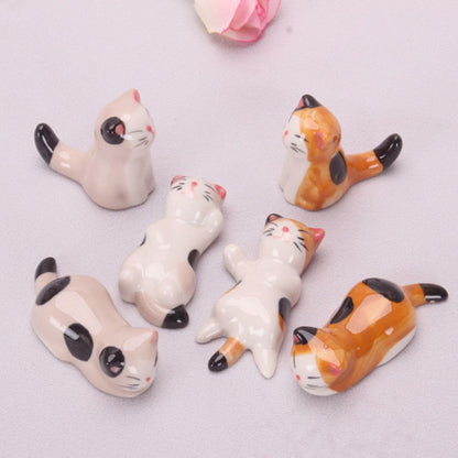 Porcelain Cat Chopstick Holders SetKitchenYellow Pandoracat, chopsticks, dining, gift, gift ideas, kitchen, kitten19cat, chopsticks, dining, gift, gift ideas, kitchen, kittenKitchenPorcelain Cat Chopstick Holders SetPorcelain Cat Chopstick Holders Set - Premium Kitchen from Yellow Pandora - Just CHF 19! Shop now at Maria Bitonti Home Decor